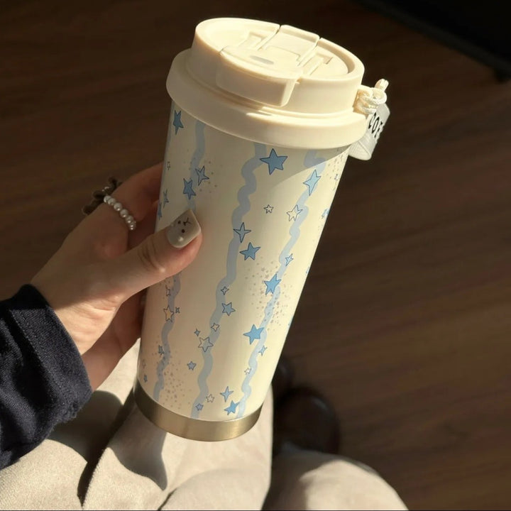 Women's insulated mug with practical carrying handle and charming Hello Kitty design Bowlift