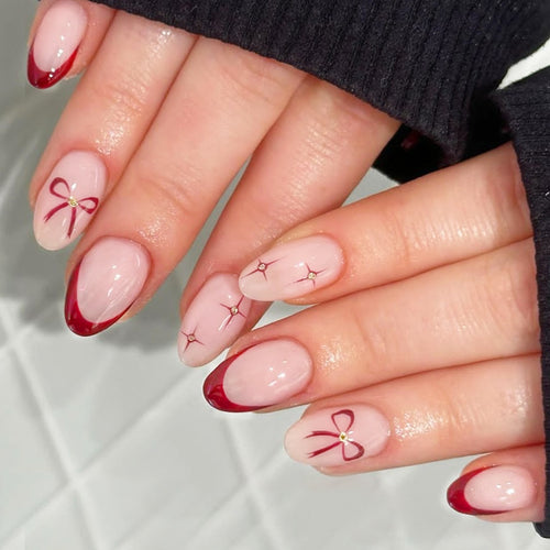 Acrylic nail set with elegant arch design and glitter effects Bowlift