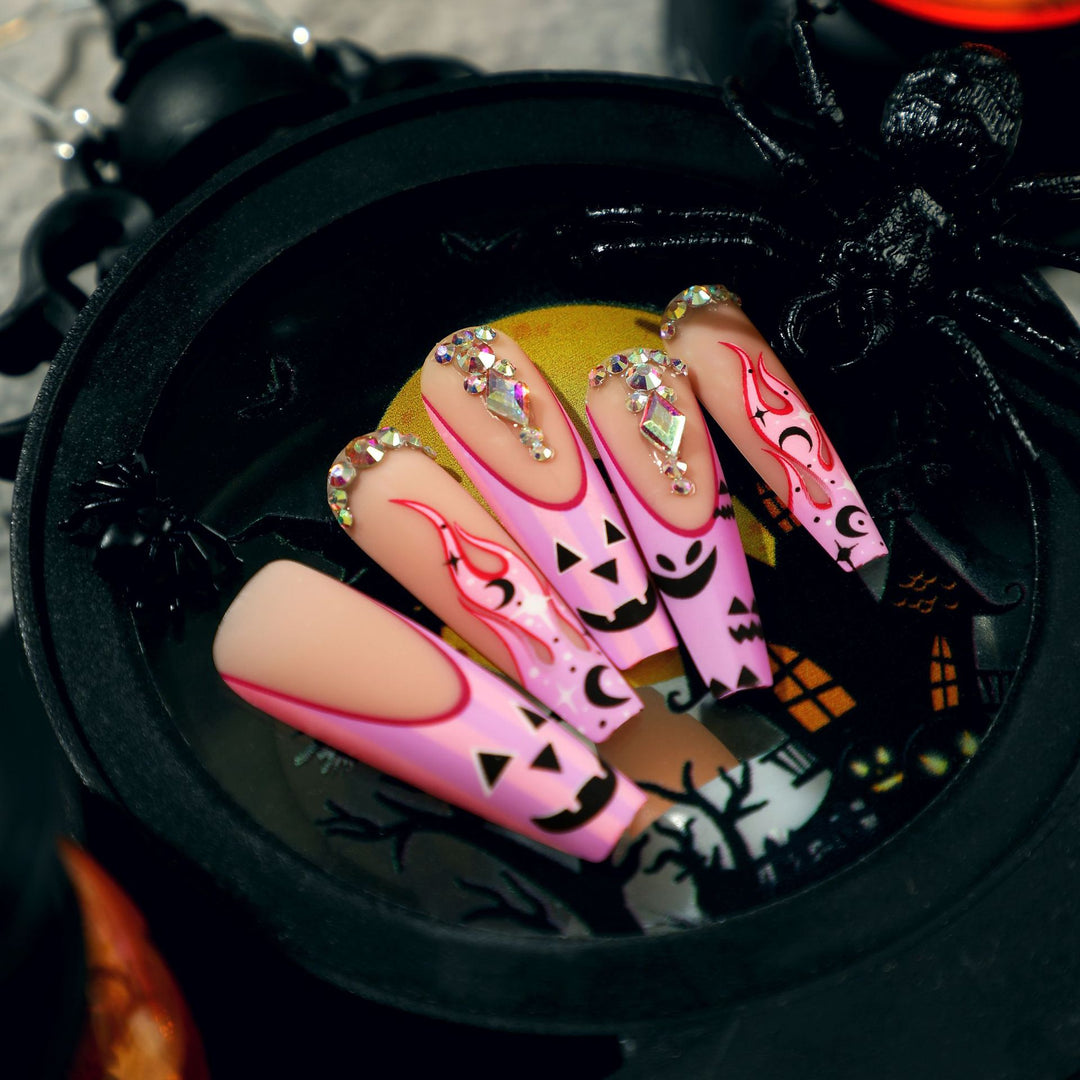 Artificial nail art with festive design and glitter variations Bowlift