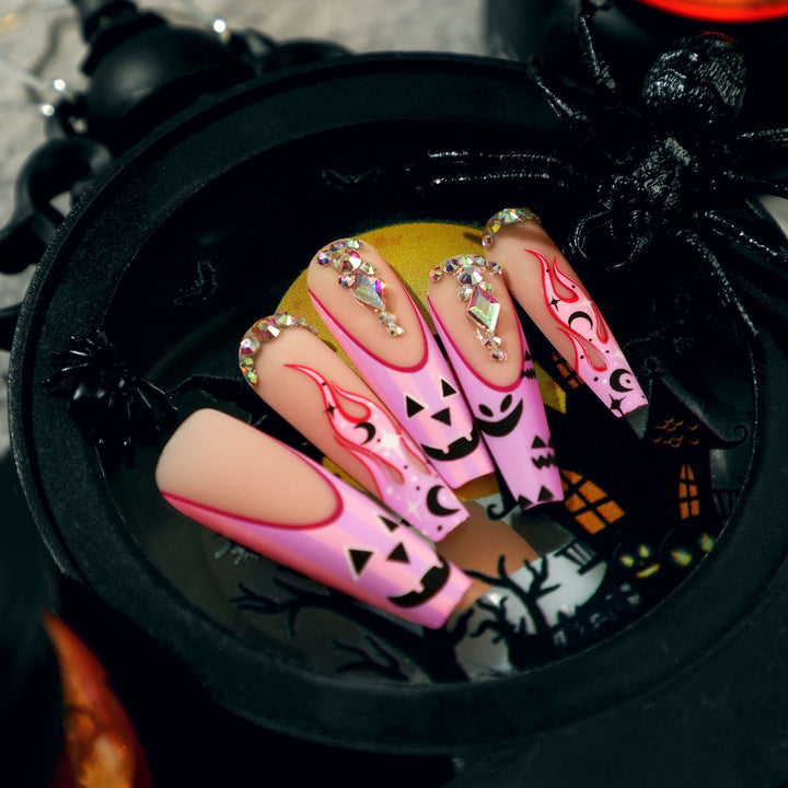 Artificial nail art with festive design and glitter variations Bowlift