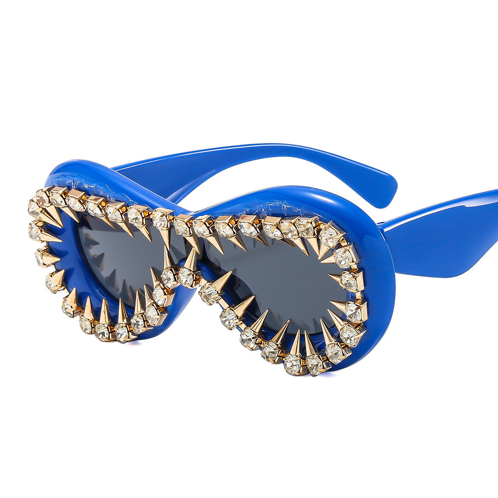 Women's fashionable sunglasses with extravagant spikes and crystal embellishments Bowlift