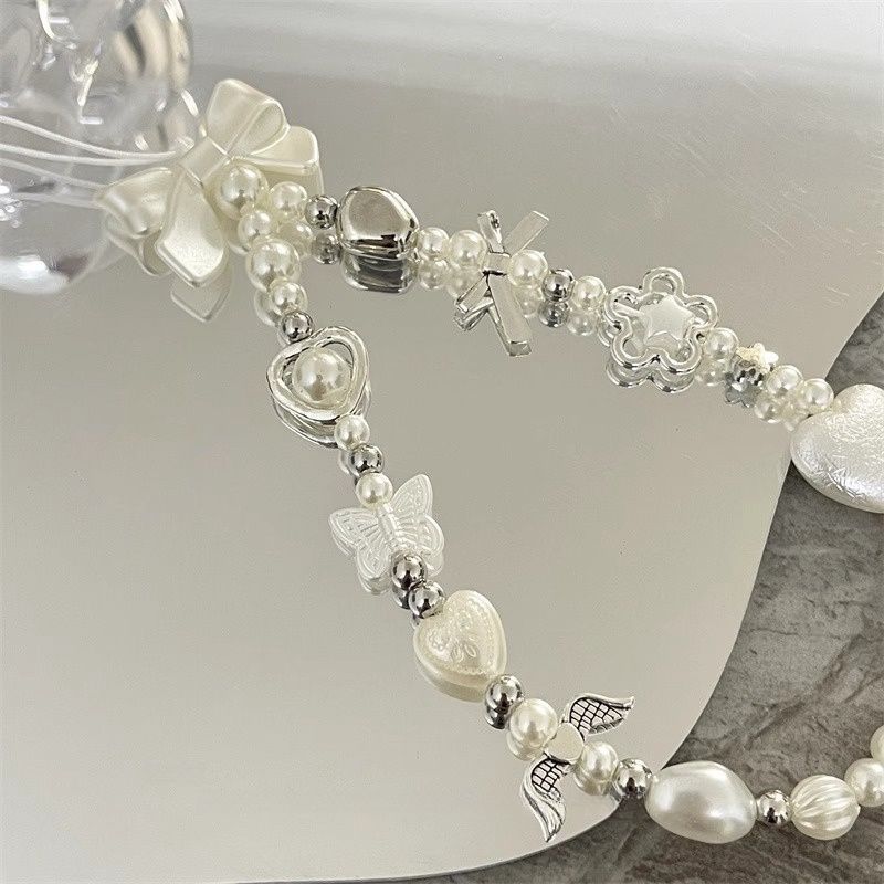 Heart and Butterfly Charm Beaded Bracelet Bowlift
