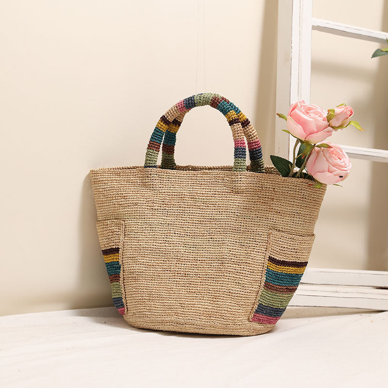 Handcrafted basket bag with colorful stripe accents Bowlift