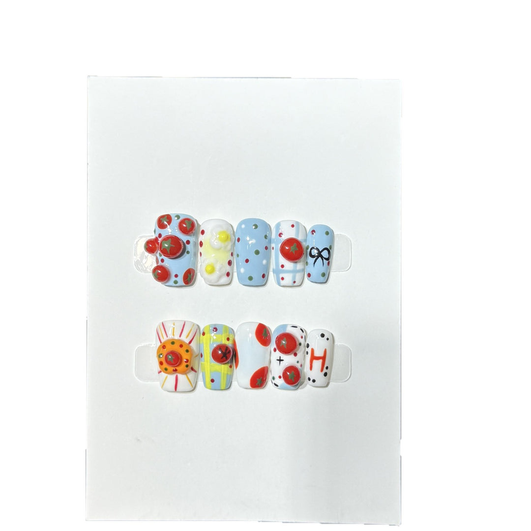 Artistic Press-On Nail Set with Playful Floral and Polka Dot Designs Bowlift