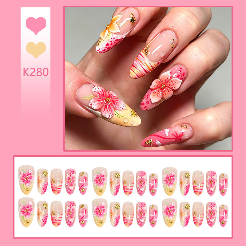 Artificial nails with floral embellishments and glitter accents Bowlift