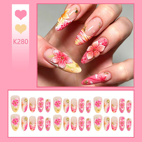 Artificial nails with floral embellishments and glitter accents Bowlift