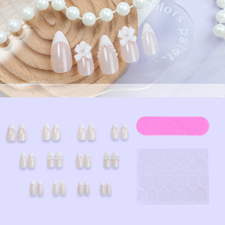 Artificial nail set with elegant bows and pearl decorations Bowlift
