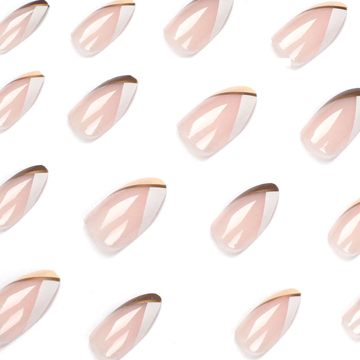 Artful nail art in elegant stiletto design with golden accents Bowlift