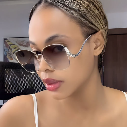 Women's striking sunglasses with sparkling appliqués Bowlift