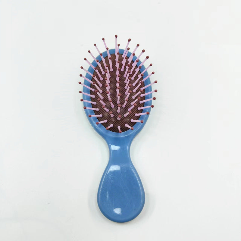 Hair comb with ergonomic handle Bowlift