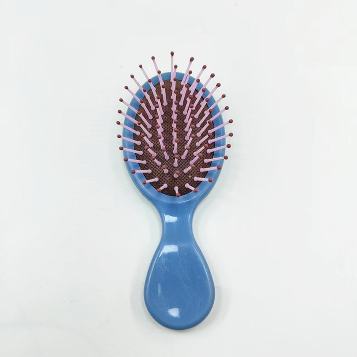 Hair comb with ergonomic handle Bowlift
