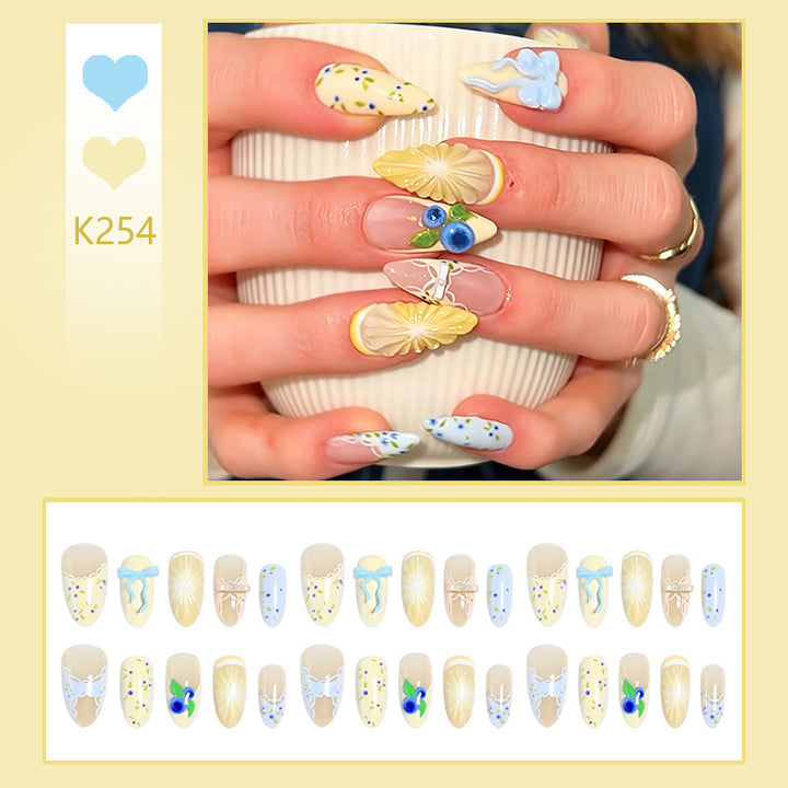 Artificial nails with playful floral design Bowlift