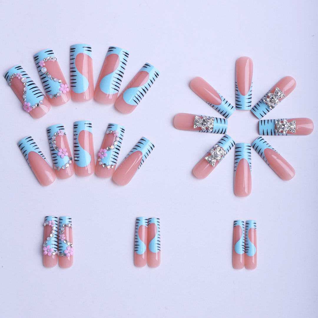 Artificial nails with elaborate decorations Bowlift