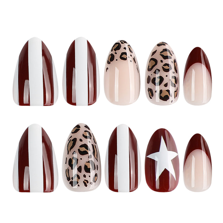 Artful stiletto nails with leopard pattern and elegant glitter decoration Bowlift