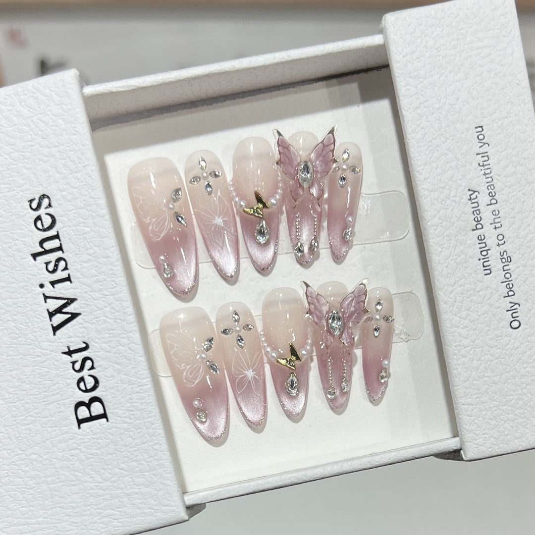 Artistic Stiletto Press-On Nail Design Set with Butterfly and Gemstone Accents Bowlift