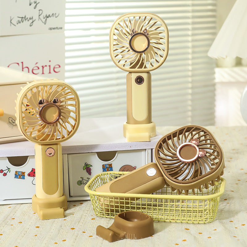Women's portable mini hand fan with USB charging function and flexibly adjustable tilt angle Bowlift