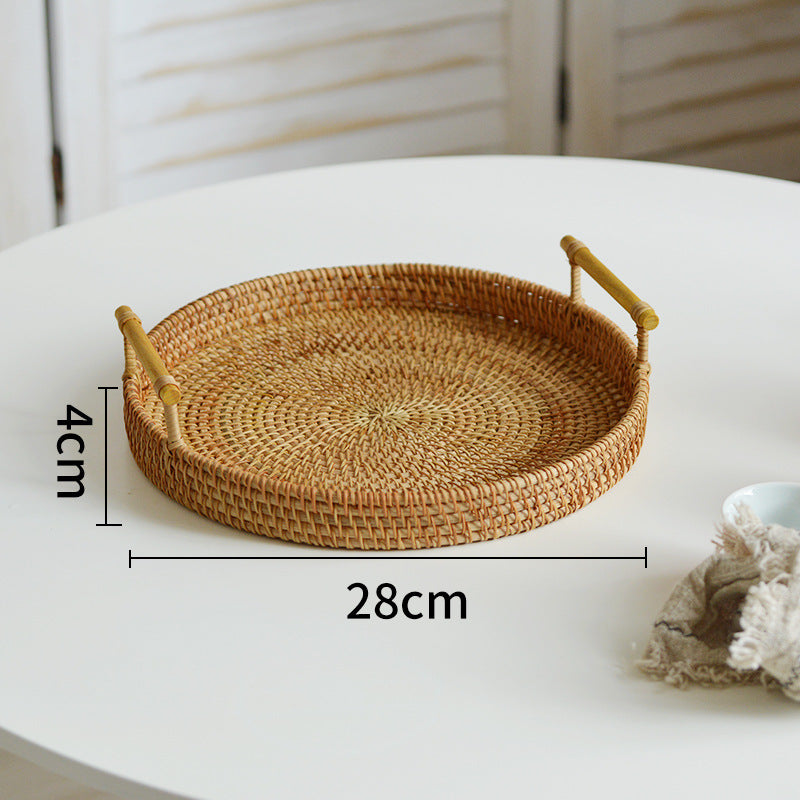 Round serving platter made of braided rattan Bowlift