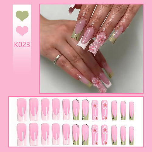 Artful nail tips with floral embellishments Bowlift