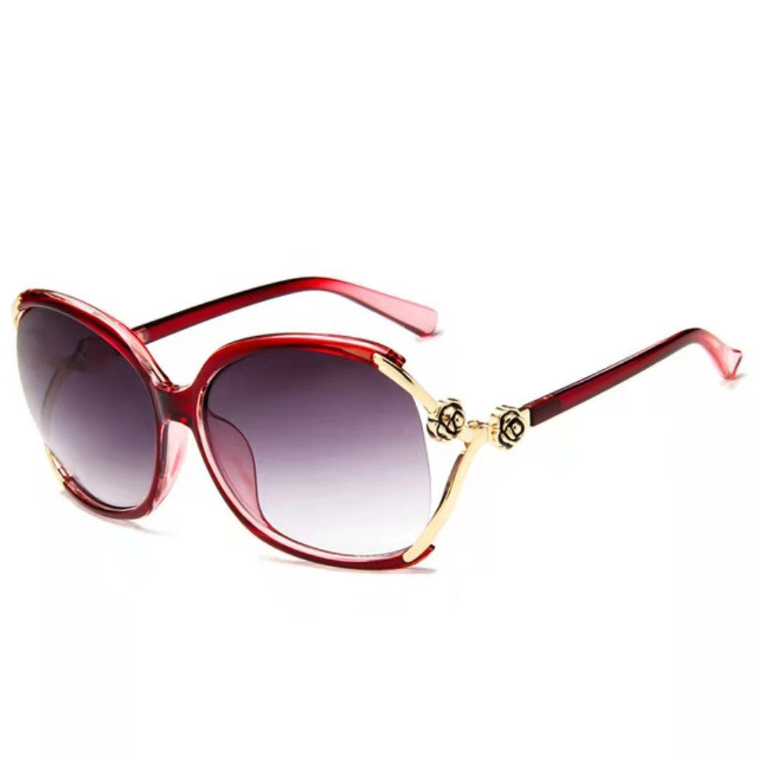 Ladies elegant oversized sunglasses with golden accents Bowlift
