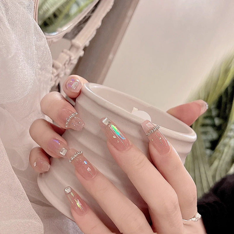 Acrylic nail set with glamorous rhinestone and glitter elements Bowlift