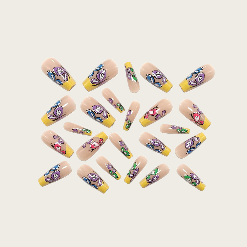 Nail set with intricate butterfly design Bowlift
