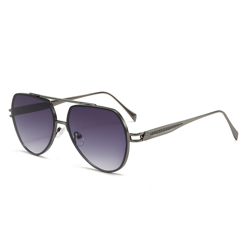 Women's designer sunglasses in a stylish, curved metal frame Bowlift