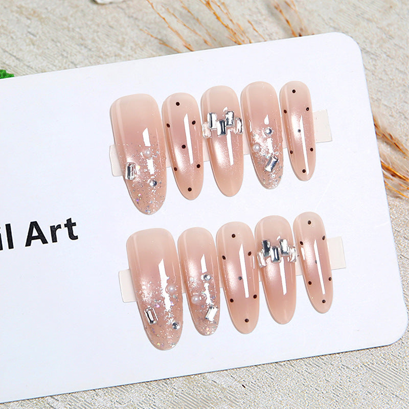 Artificial nail set with sparkling glitter and elegant jewelry details Bowlift