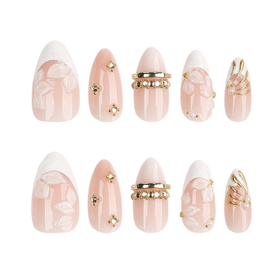 Artful nail art with floral and rhinestone accents Bowlift