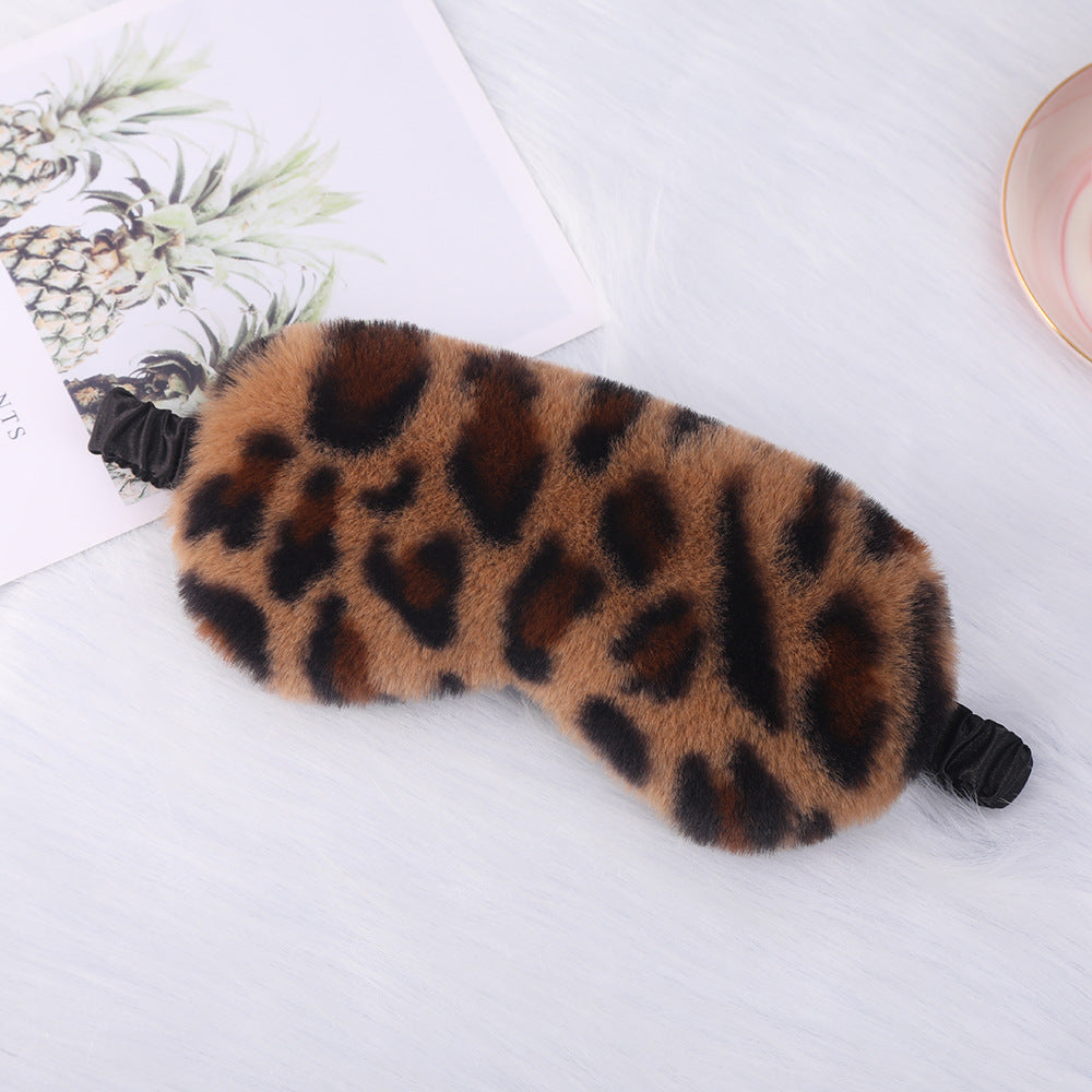 Women's cuddly faux fur sleep mask with heart-embossed surface and gathered comfort band Bowlift
