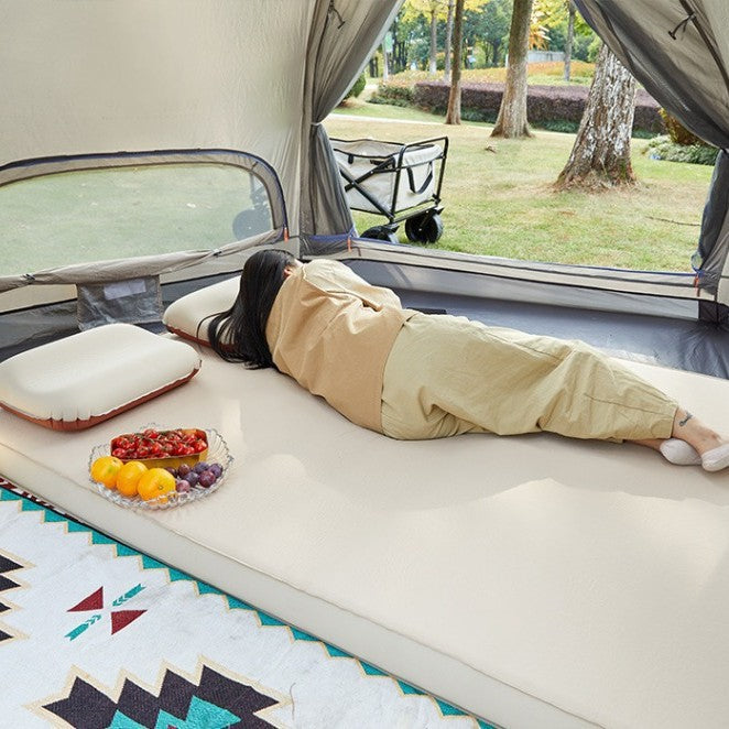 thick inflatable camping mattress with integrated pillow and puncture-resistant TPU shell Bowlift