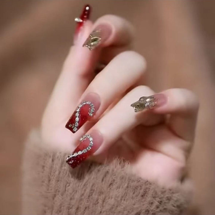 Artificial artificial fingernails with elegant heart accents Bowlift