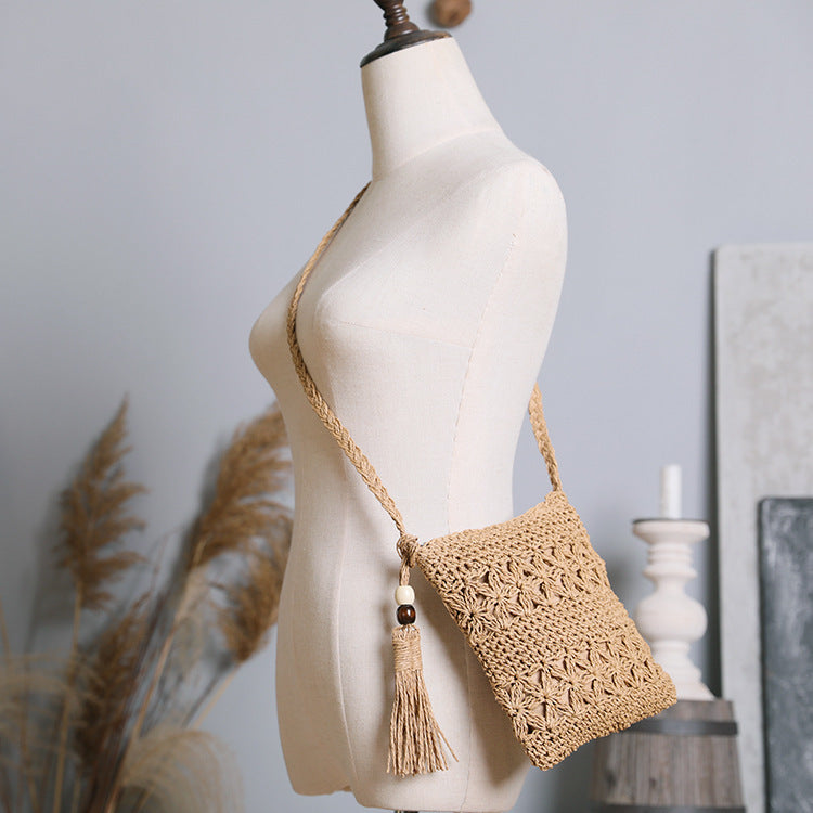 Handmade macrame shoulder bag with tassel detail Bowlift