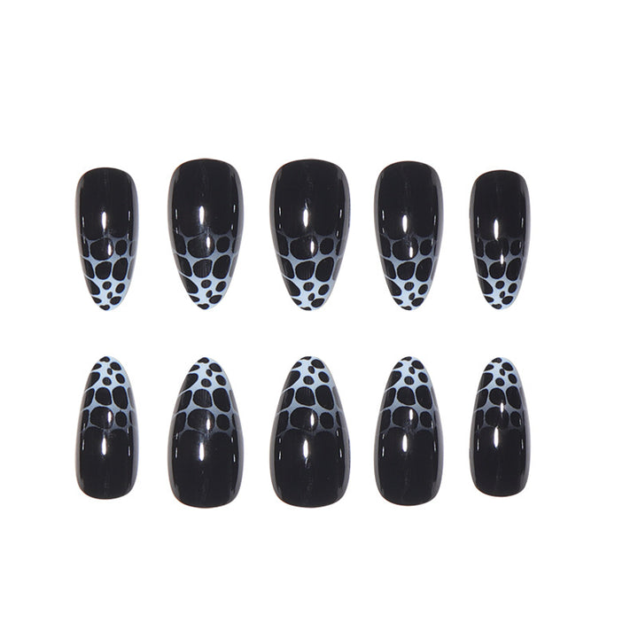 Stiletto Nail Art with Abstract Patterns Bowlift