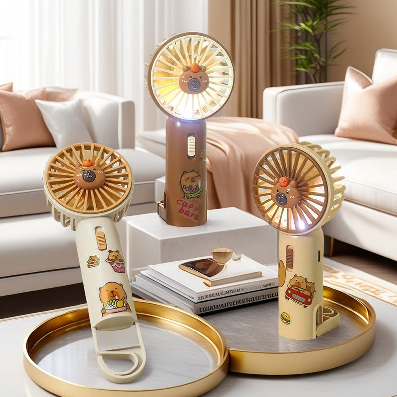 Unisex portable USB hand fan with integrated LED light and clip Bowlift