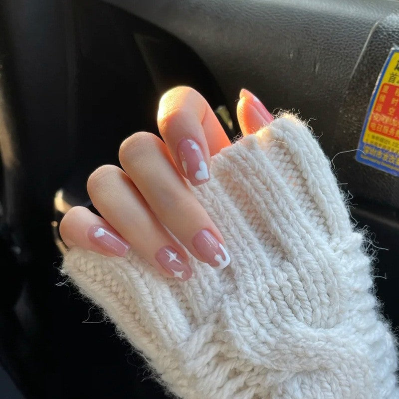 Artificial nails with elegant bow accents and pearl decorations Bowlift
