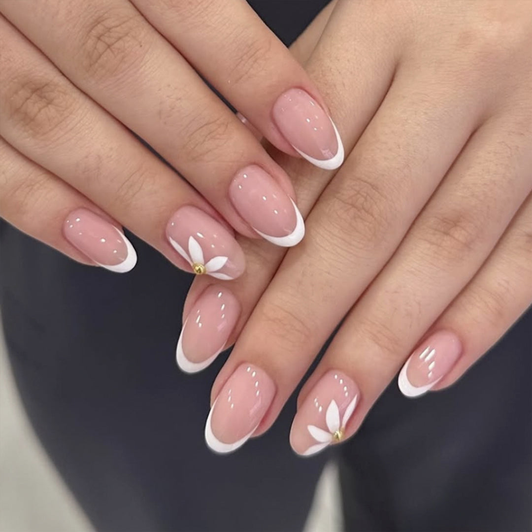 Artful French nails with delicate flowers and glitter accents Bowlift