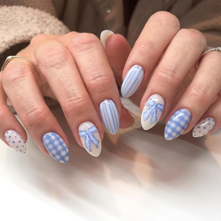 Artistic Nail Art with Floral and Polka Dot Designs Bowlift