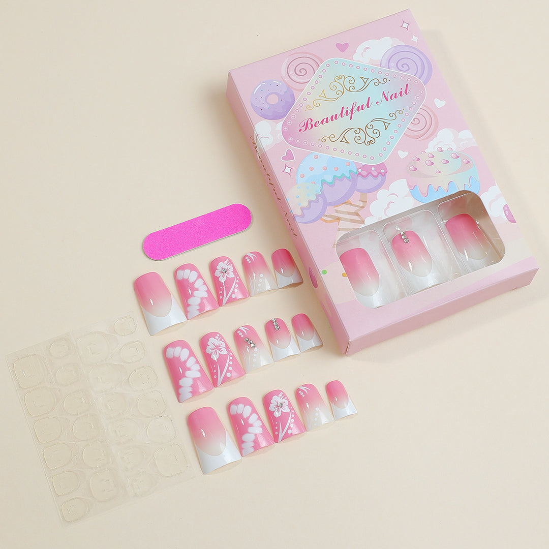 Acrylic nail set with elegant floral designs and glitter accents Bowlift