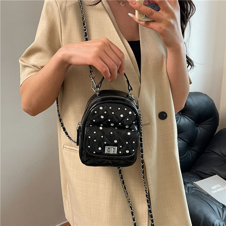 Quilted Mini Backpack with Rhinestone Accents Bowlift