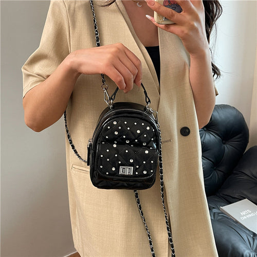 Quilted Mini Backpack with Rhinestone Accents Bowlift