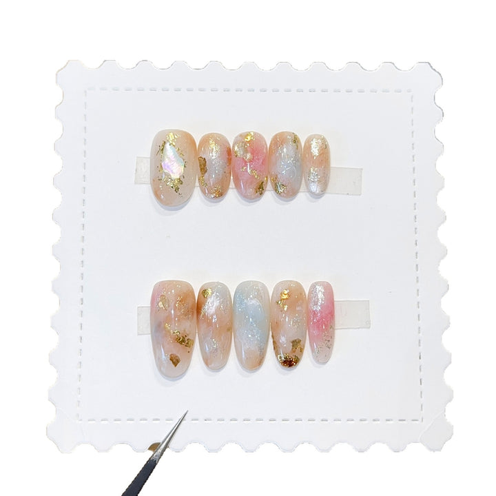 Artificial nails with glamorous metallic details and sparkling design Bowlift