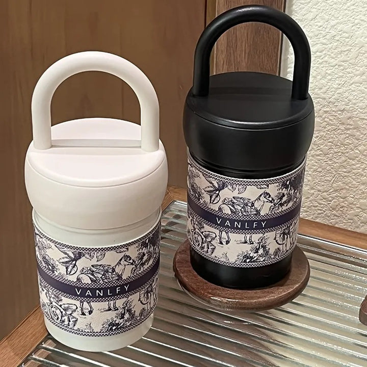 Women's stylish thermos cup with practical carrying handle Bowlift