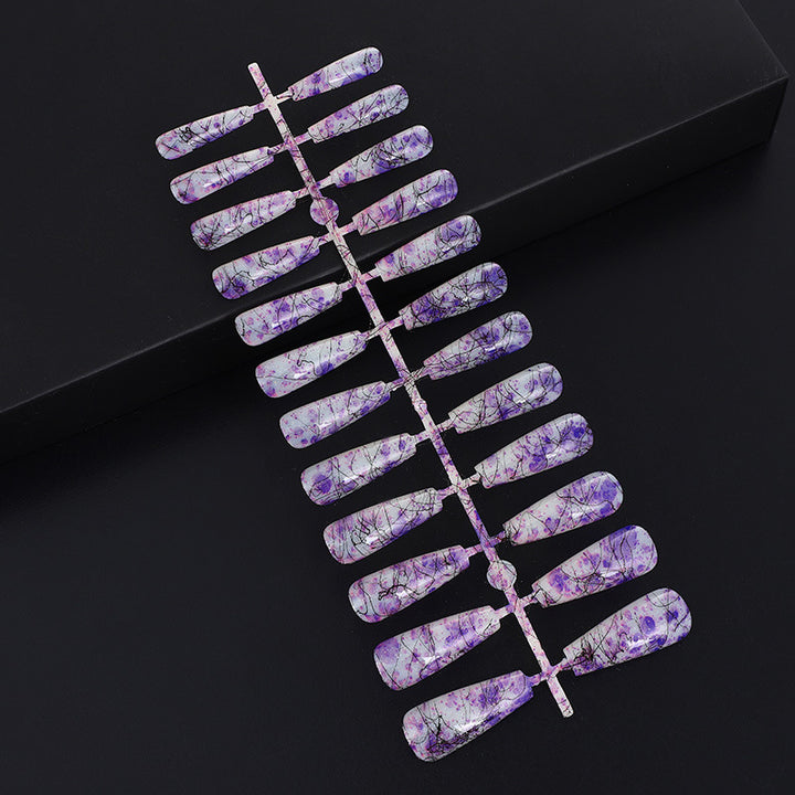 Creative nail art with blood splatter design Bowlift