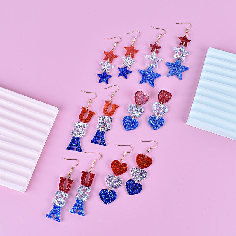 Women's long star pendant earrings made of glitter resin with three-tier chain suspension and fishhook bowlift