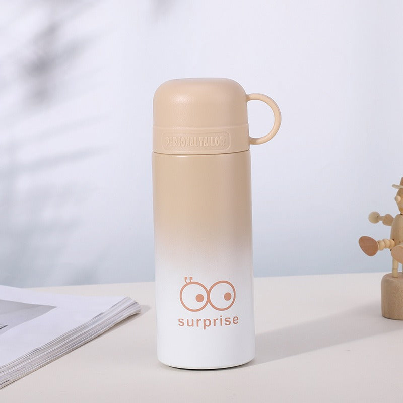 Ladies trendy thermos bottle with practical carrying handle Bowlift