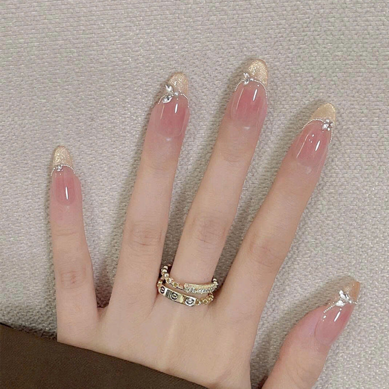 Elegant Press-On Nail Set with Artistic Detailing Bowlift