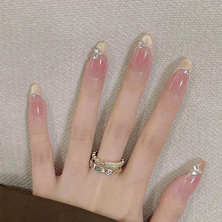 Elegant Press-On Nail Set with Artistic Detailing Bowlift