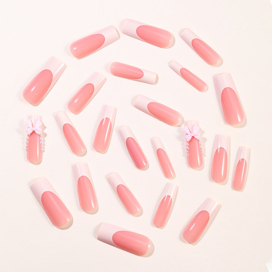 Elegant Stiletto Nail Art Extensions with Pearl and Bow Accents Bowlift