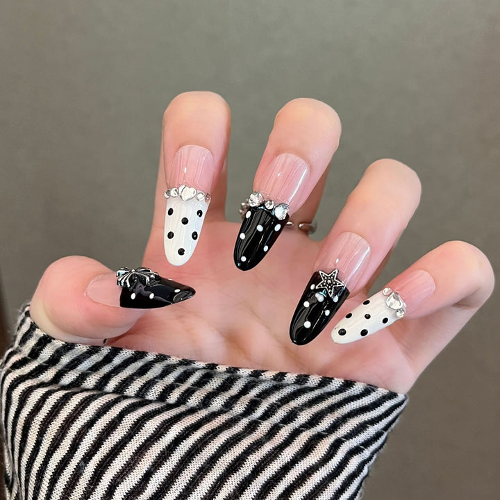 Artistic Stiletto Press-On Nail Art with Glimmering Accents Bowlift
