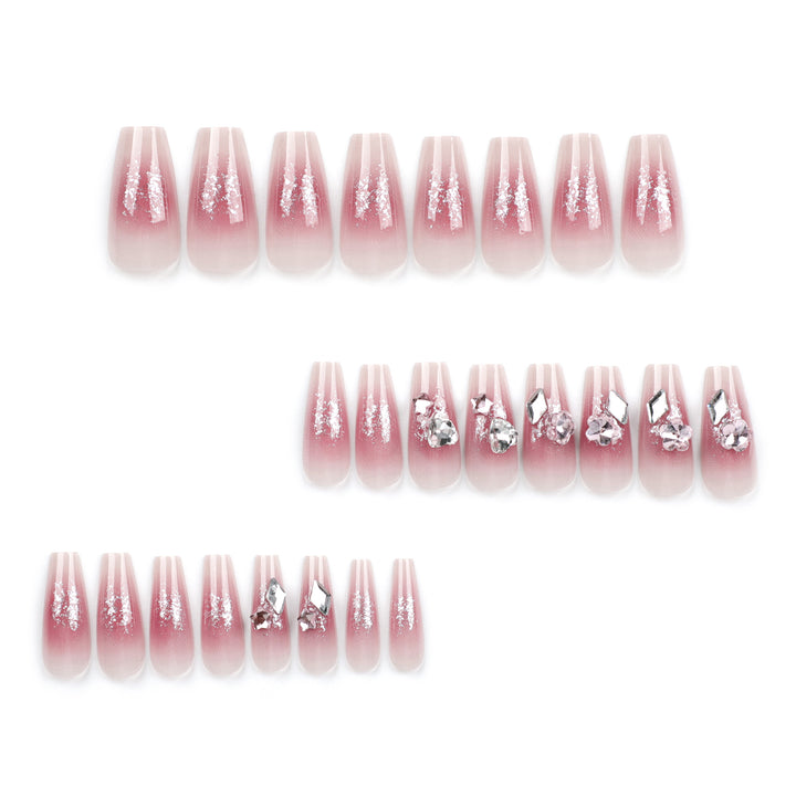 Glamorous artificial nails with glitter and crystal embellishment Bowlift
